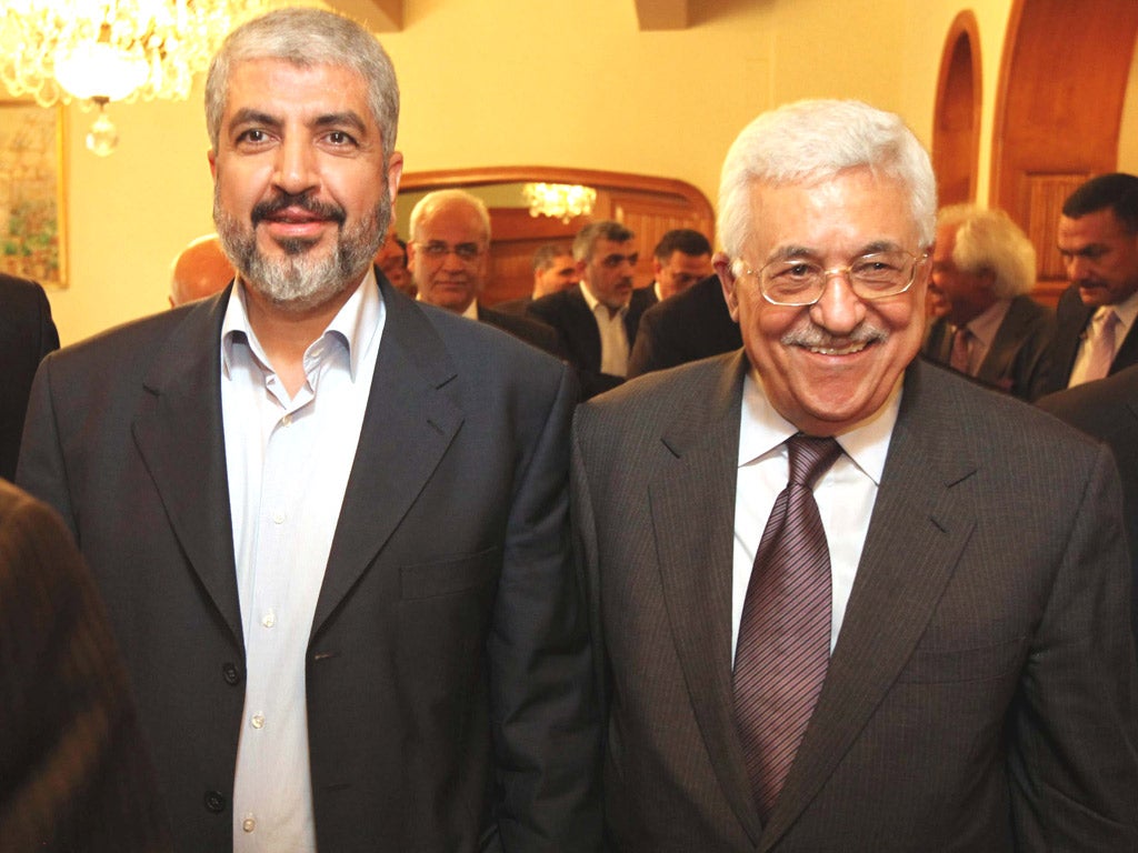 Khaled Meshaal, left, was keen to broker a deal with President Mahmoud Abbas of Fatah, right