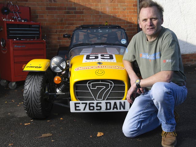 Wheel life: Adrian Hume with the Caterham kit car he built and races in memory of his son,Daniel