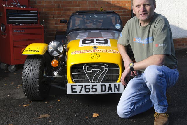 Wheel life: Adrian Hume with the Caterham kit car he built and races in memory of his son,Daniel