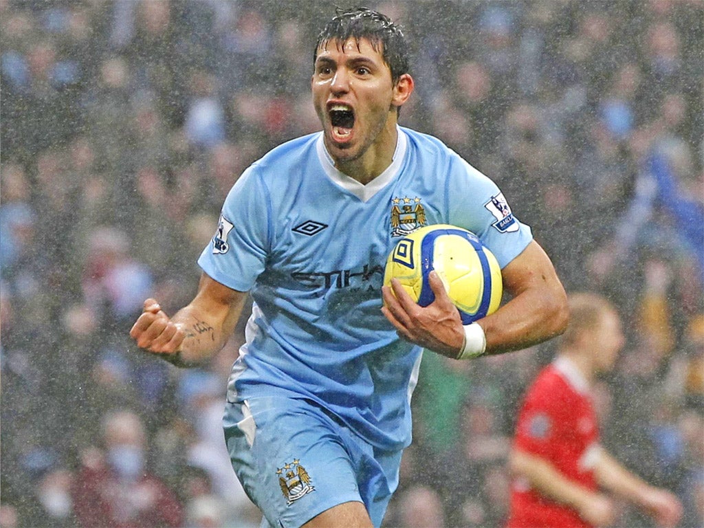 Sergio Aguero celebrates scoring for Manchester City in their home FA Cup defeat by neighbours and rivals United