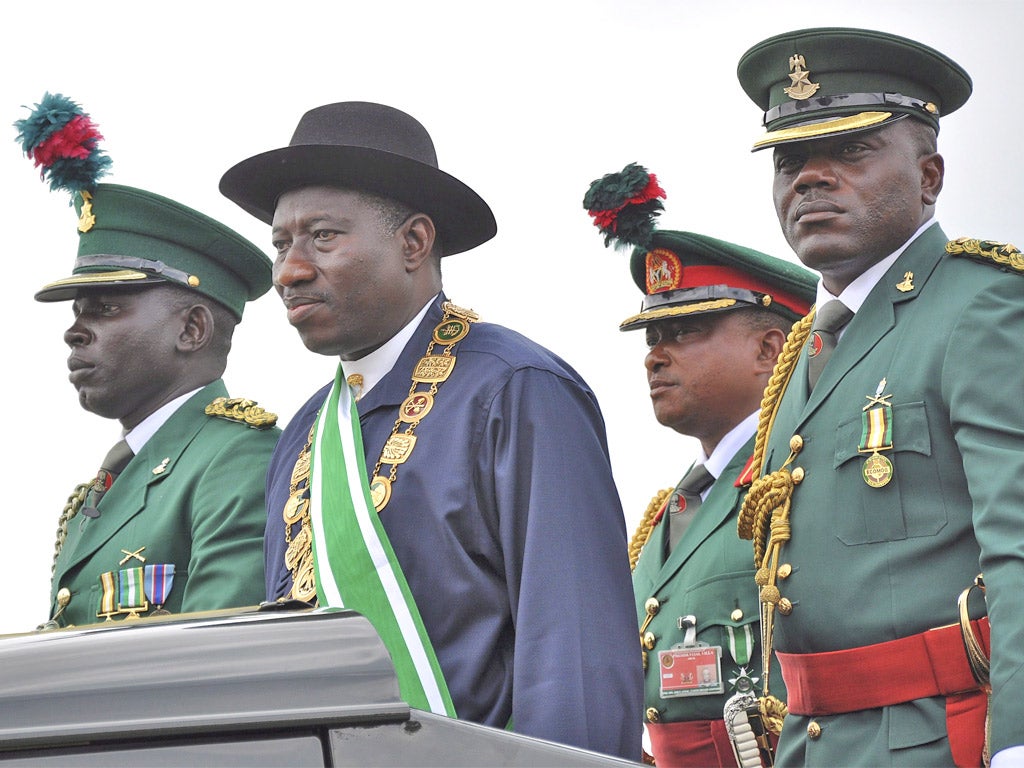 The newly elected President Goodluck Jonathan (second left) has been unable to stop the insurgency in northern Nigeria