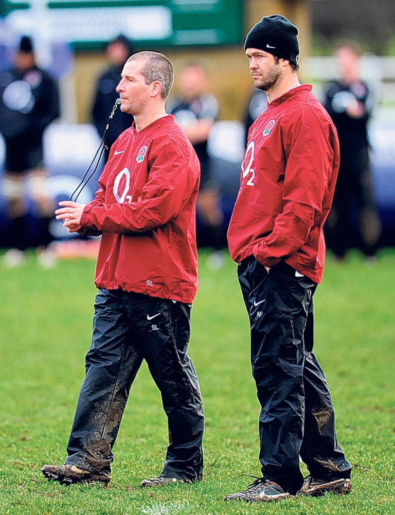 England coaches Andy Farrell (right) and Stuart Lancaster watch a training session in Leeds yesterday