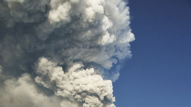 Big smoke: Mount Etna rumbles in the distance