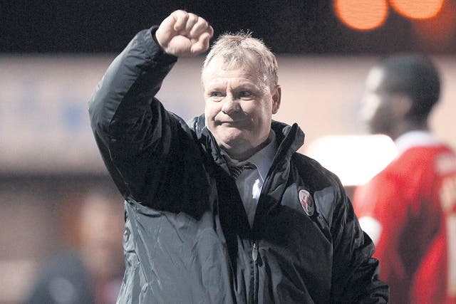 Steve Evans denies the suggestion that Crawley have bought their way into the Football League