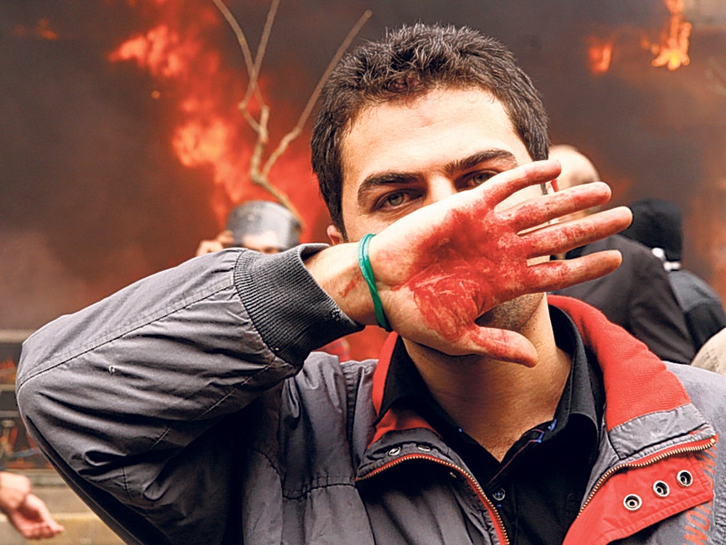 A demonstrator in Iran during protests against the election result in 2009