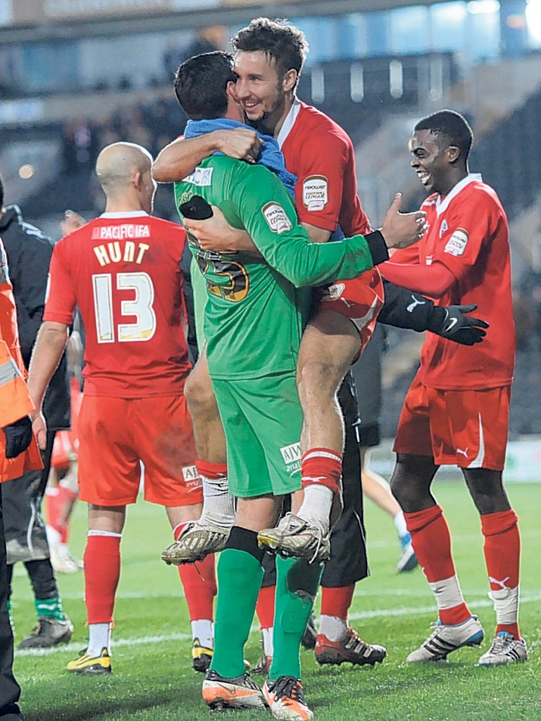 Bundle of joy: Goalscorer Matt Tubbs celebrates Crawley’s humbling of Hull