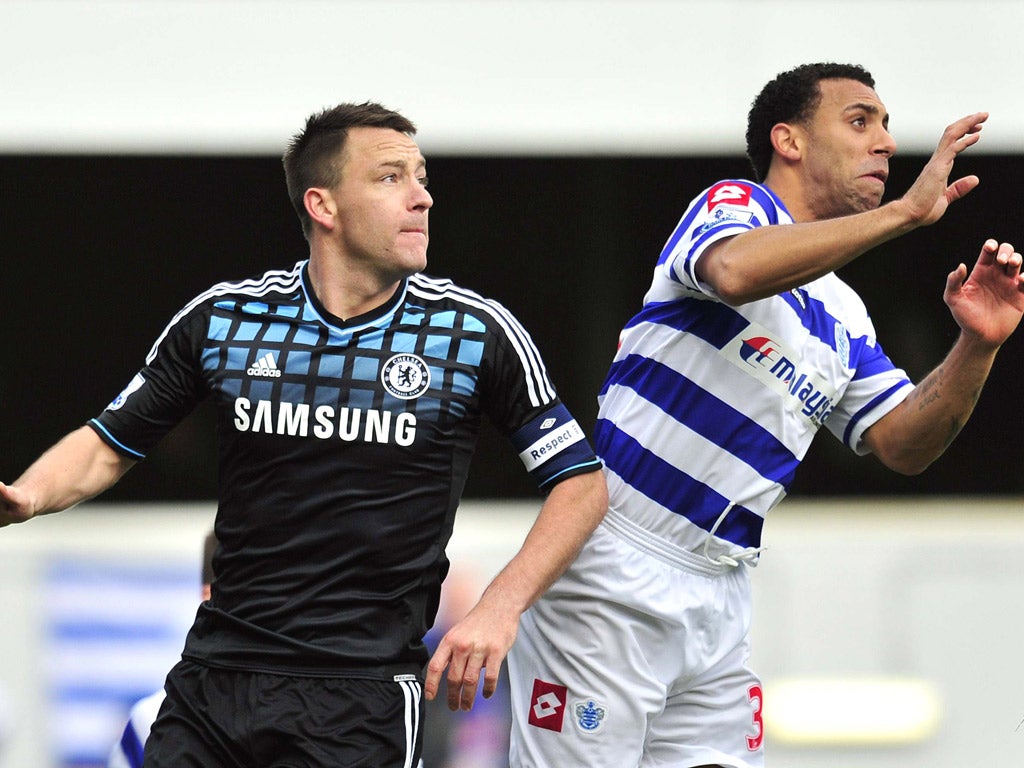 John Terry challenges Anton Ferdinand for the ball on Saturday