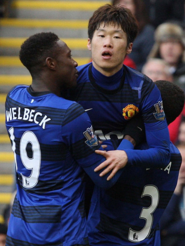 Park Ji-sung celebrates his goal for Manchester United at Liverpool