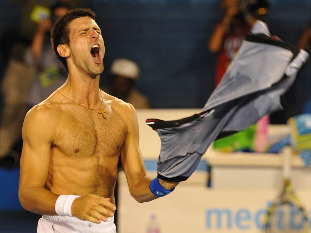 Novak Djokovic savours the moment after beating Rafa Nadal to win the Australian Open in an epic final that finished at 1.37am