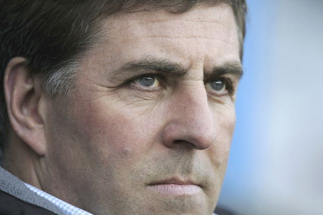 Bristol Rovers manager Mark McGhee plans
to climb back up the leagues