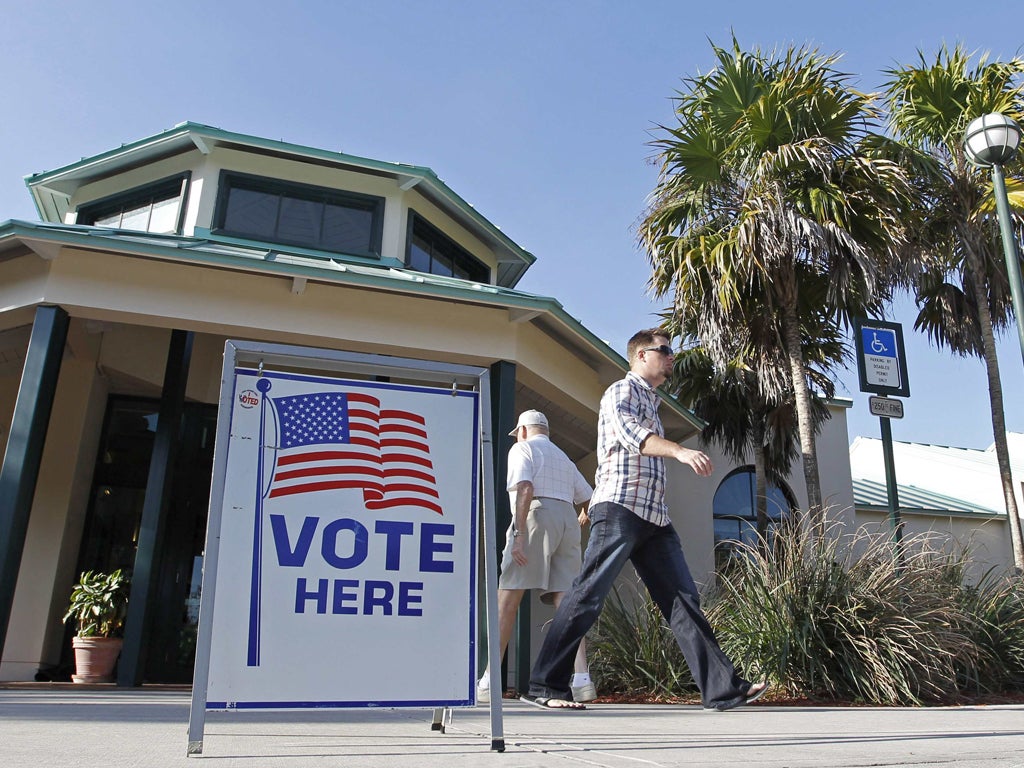 Voters in the Florida Republican presidential primary are shown at a polling station