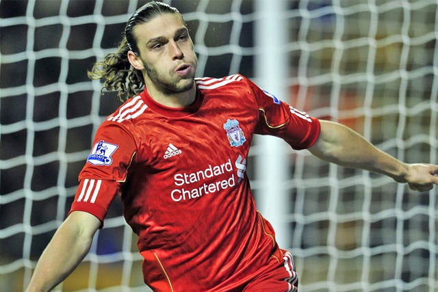 Andy Carroll wheels away after putting Liverpool on their way to a win at Wolves
