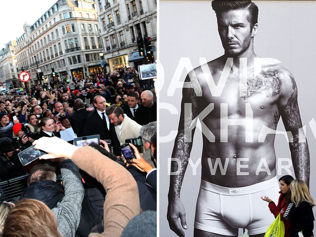 Hundreds of fans gave David Beckham (and his pants, right) a rapturous reception in Regent Street yesterday