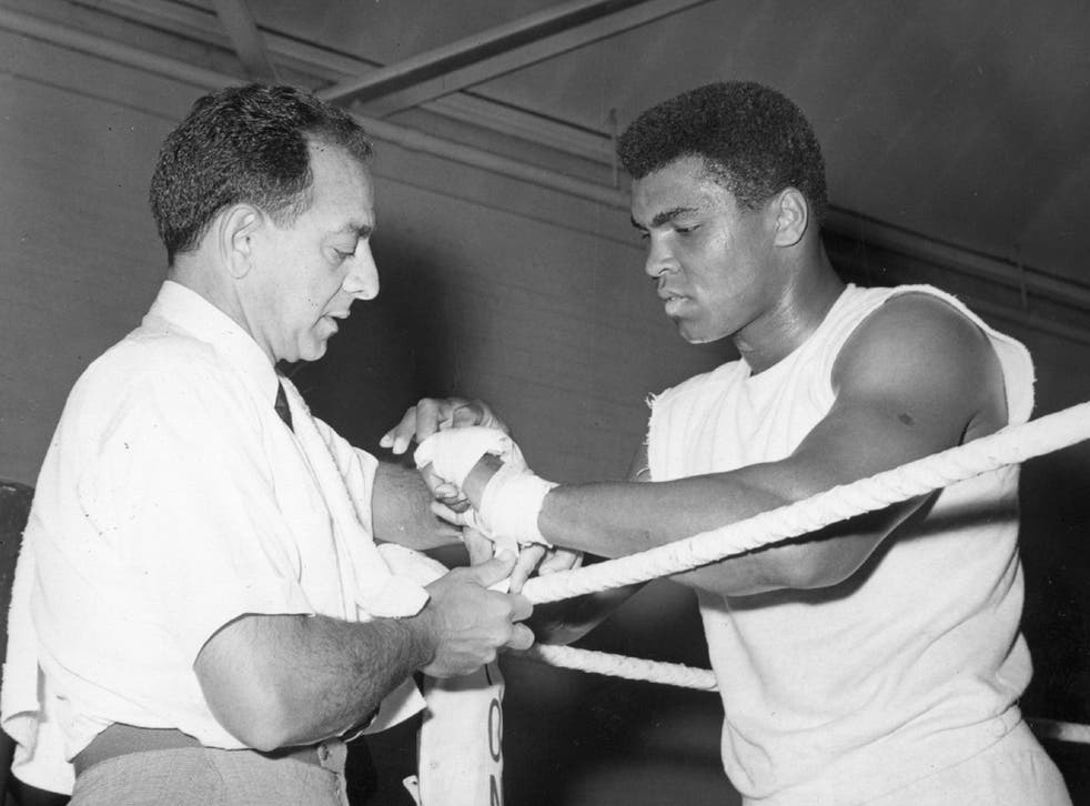 Dundee tends to Muhammad Ali in the run-up to the fight against Henry Cooper at Highbury in 1966