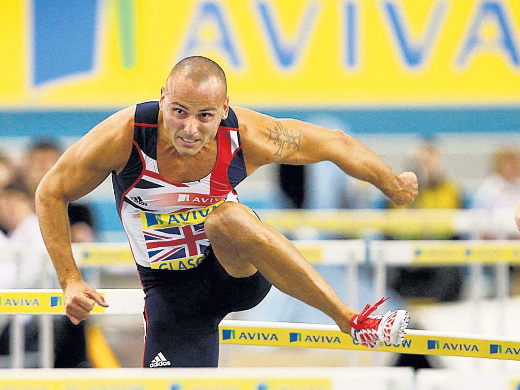 Andy Turner on his way to last place in the 60m hurdles in Glasgow