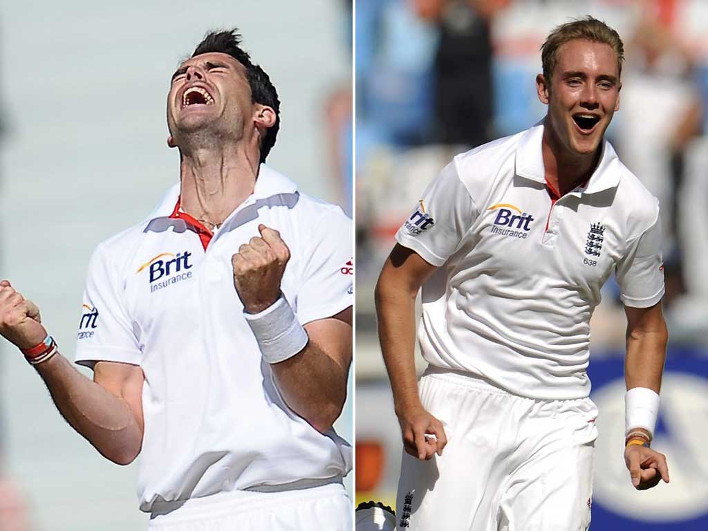 James Anderson and Stuart Broad celebrate during their face-saving performances for England in Dubai today