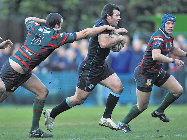 Craig Gower (centre), of London Broncos, in action during the friendly with London Skolars last week