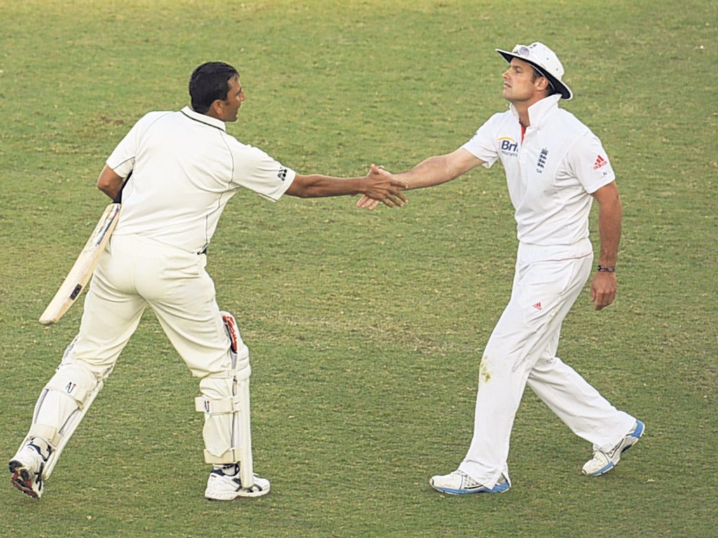 Shake on it: Andrew Strauss (right) congratulates Younis Khan on his century
