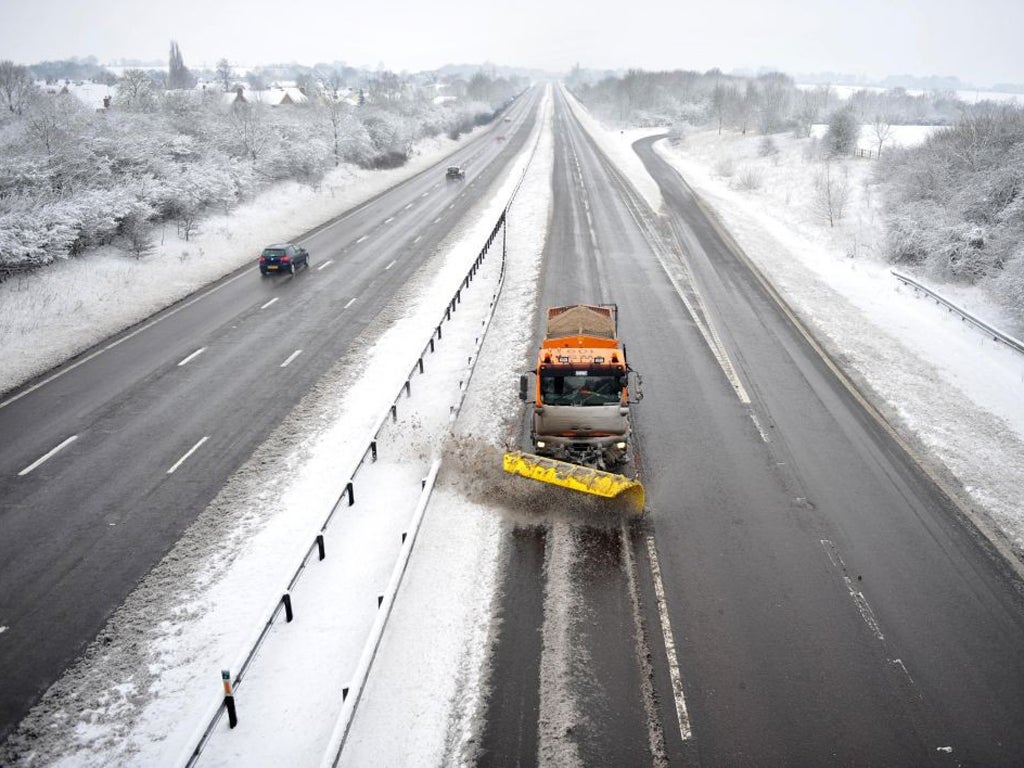 Many motorway drivers were forced to spend the night in their cars as the snow brought traffic to a standstill on the M25, while Heathrow Airport cancelled a third of its flights