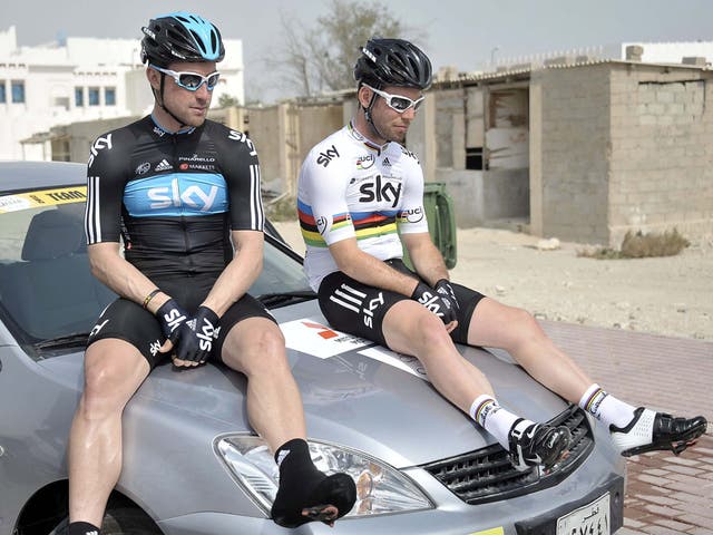 Mark Cavendish (right) with Sky team-mate Bernie Eisel in Doha