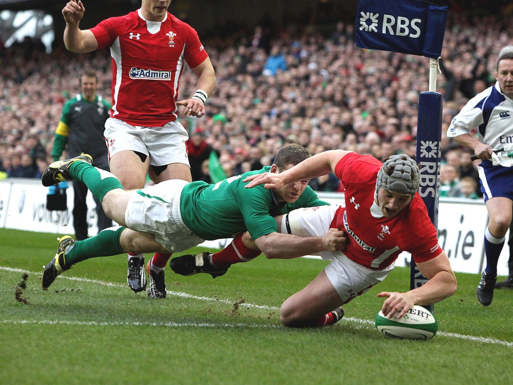 Gordon D’Arcy fails to stop Jonathan Davies scoring a try during Wales’ last-gasp win