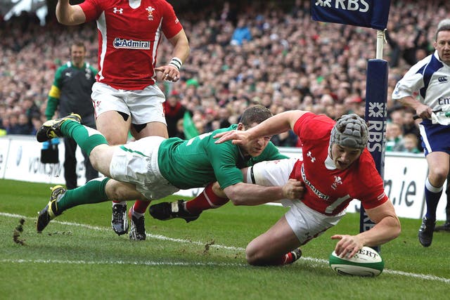 Gordon D’Arcy fails to stop Jonathan Davies scoring a try during Wales’ last-gasp win