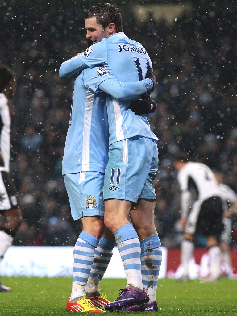 Adam Johnson celebrates after his shot was
turned in to his own net by the unfortunate Baird