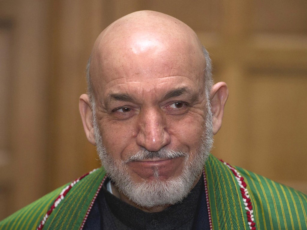 HAMID KARZAI: Civilian deaths are big cause of
friction between Afghan president and Nato