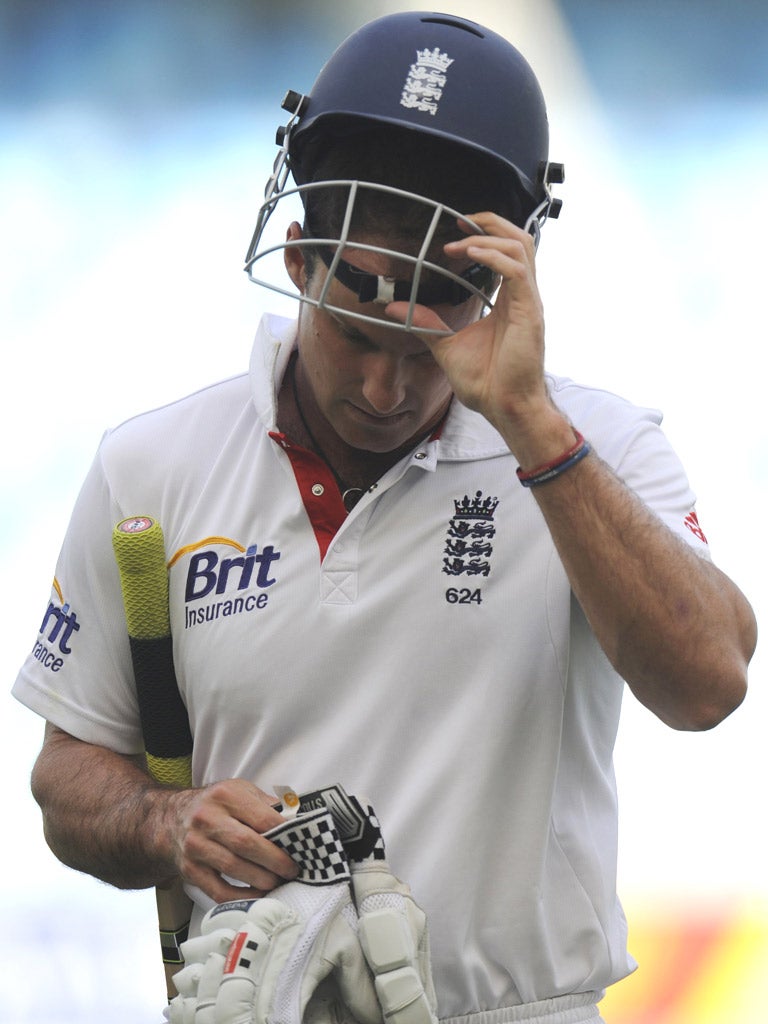 Andrew Strauss trudges off after his dismissal in the
crushing defeat to Pakistan in Dubai