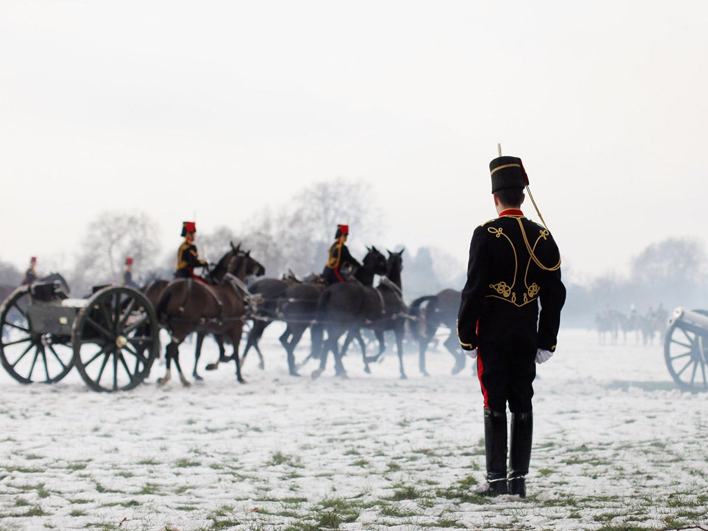 The King's Troop Royal Horse Artillery fire a 41 gun salute in Hyde Park to commemorate the Queen’s Diamond Jubilee yesterday