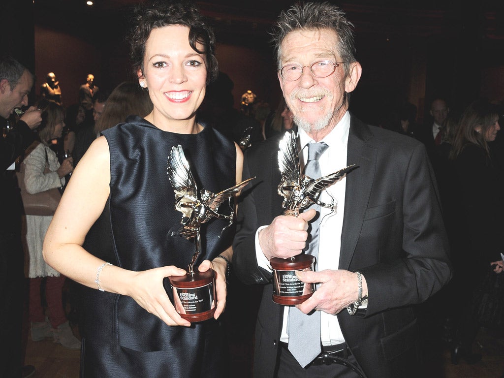 Award-winners Olivia Colman and John Hurt at the London Evening Standard British Film Awards last night