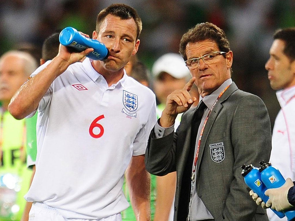Capello in discussion with Terry during England's disastrous 2010 World Cup campaign