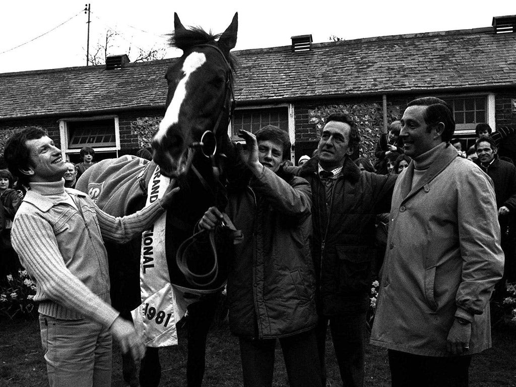 Gifford, second right, at his stables with Aldaniti, the winning jockey Bob Champion, left, and the horse’s owner Nick Embiricos, right, after victory in the 1981 Grand National
