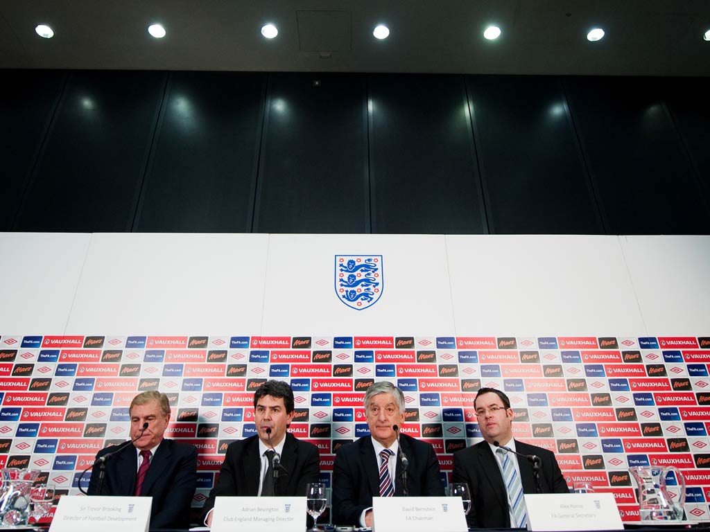 9 February 2012 Director of England's Football Development Sir Trevor Brooking, (L) Club England Managing Director Adrian Bevington (2nd L), Chairman of the English Football Association David Bernstein (2nd R) and General Secretary of the Engl