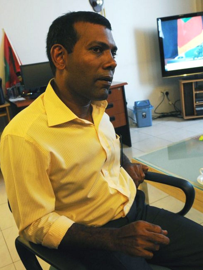 Mohamed Nasheed awaits arrest yesterday at his home in Malé
