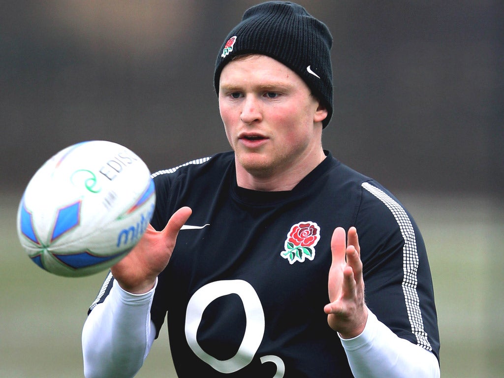 Chris Ashton receives the ball during a training
session at The Winston Churchill School in
Woking yesterday