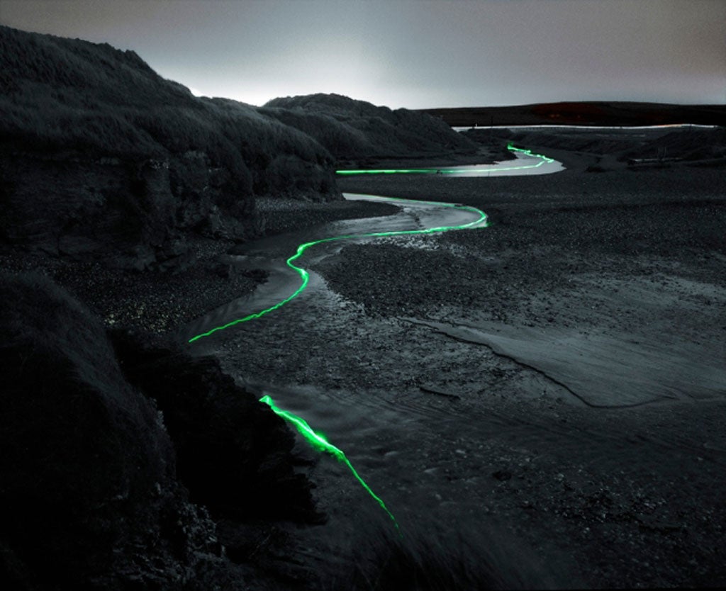A winding river in Hayle, Cornwall - the length of the exposure means that trails of light appear to trace a path along the landscapes
