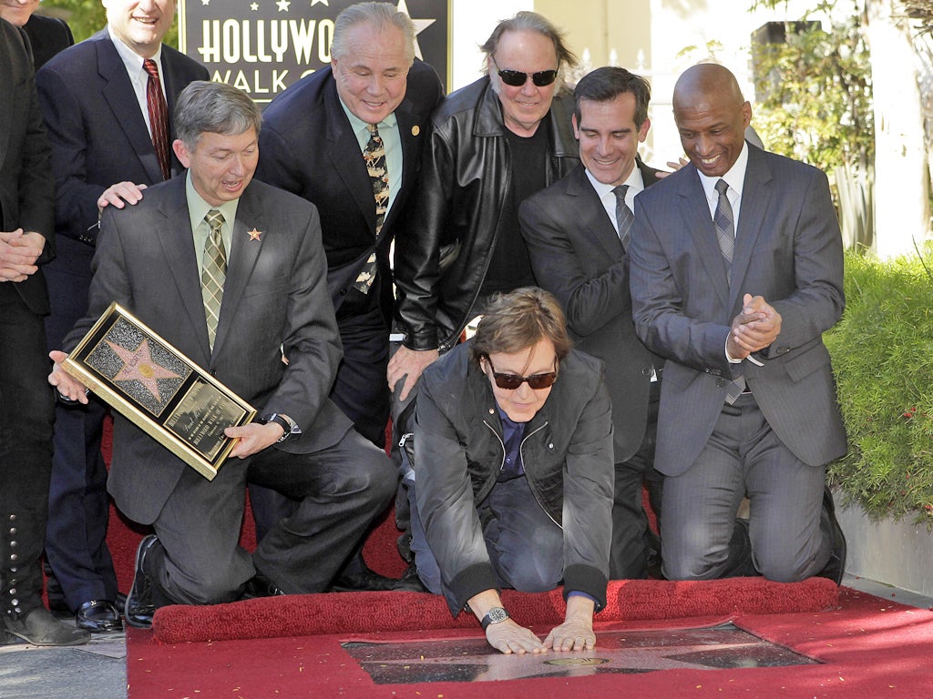 Sir Paul McCartney unveils his own star on the Hollywood Walk of Fame