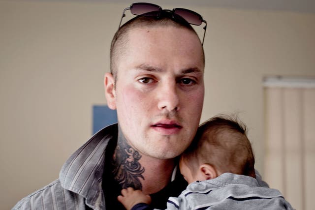 Protecting our children: Shaun with one of his eight children