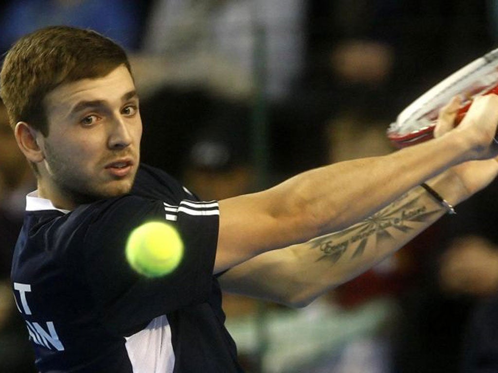 Dan Evans (pictured) on his way to victory over Slovakia's Lukas Lacko yesterday