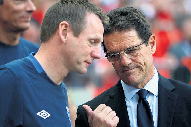 Pearce offering: Fabio Capello has thumbed a lift back to Italy while Stuart Pearce has already got caught up in a race storm