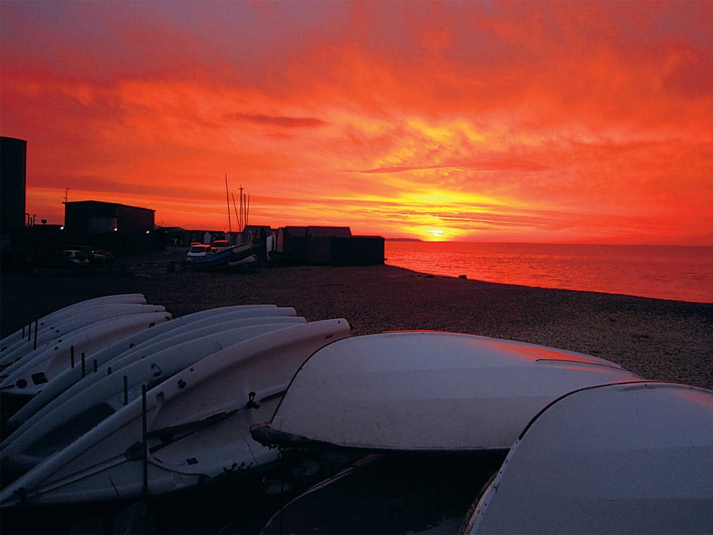 The beach has no sand, but bags of charm