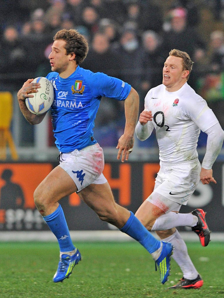 Wing without a prayer: Chris Ashton of England cannot catch Tommaso Benvenuti as the Italy centre scores his team’s second try in Rome