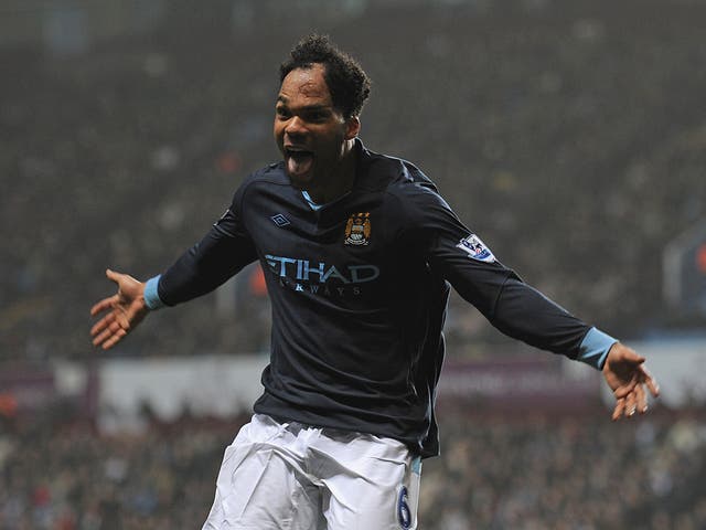 Joleon Lescott celebrates after scoring the only - and winning - goal for Manchester City against Aston Villa