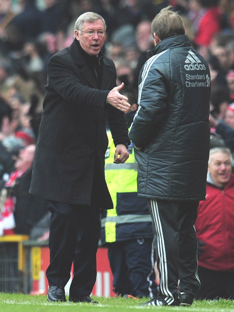 Alex Ferguson and Kenny Dalglish shake hands at the final whistle