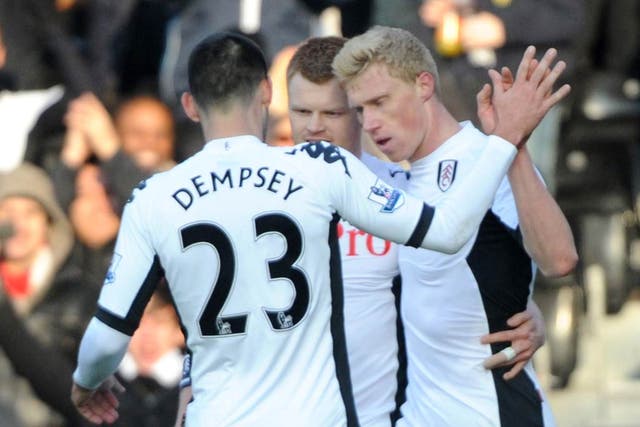 Pogrebnyak is congratulated by his Fulham team-mates