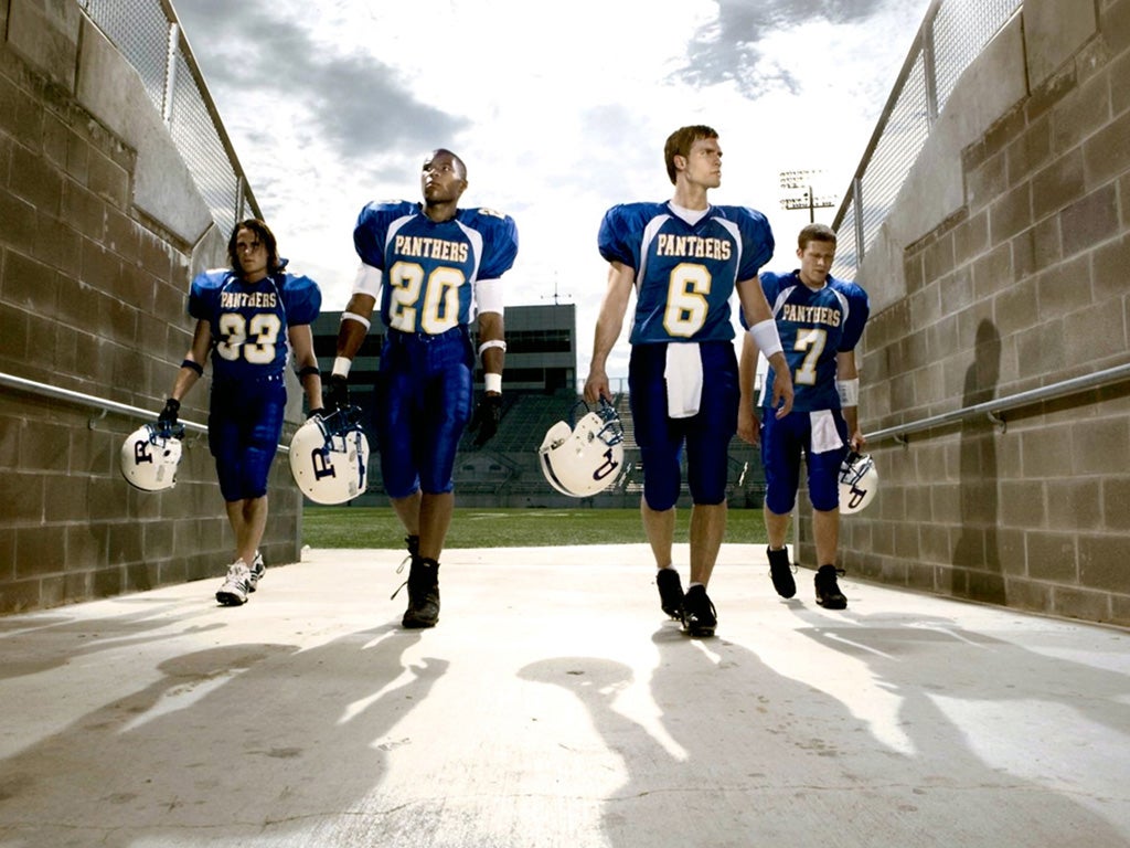 In a field of its own: the Dillon Panthers are the springboard
for the drama in 'Friday Night Lights' - but the action extends way beyond the gridiron