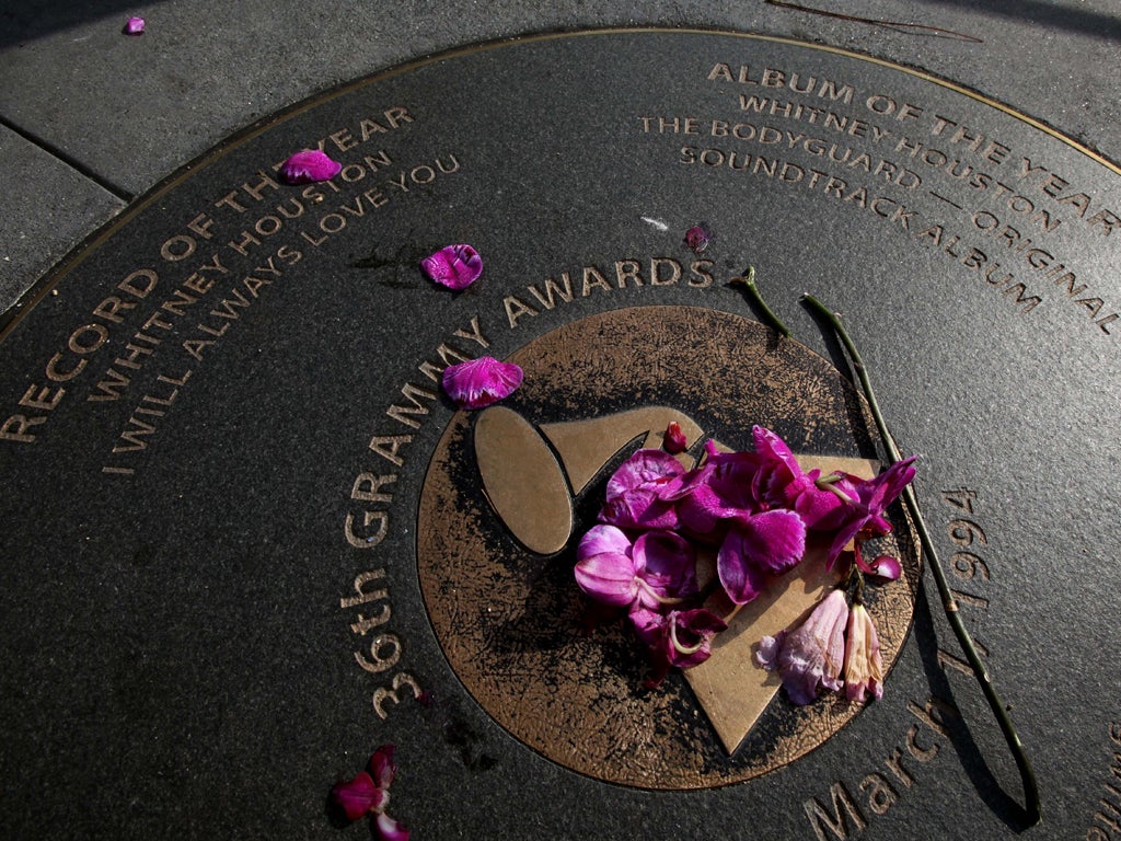 Tributes to the singer on a Grammy street plague