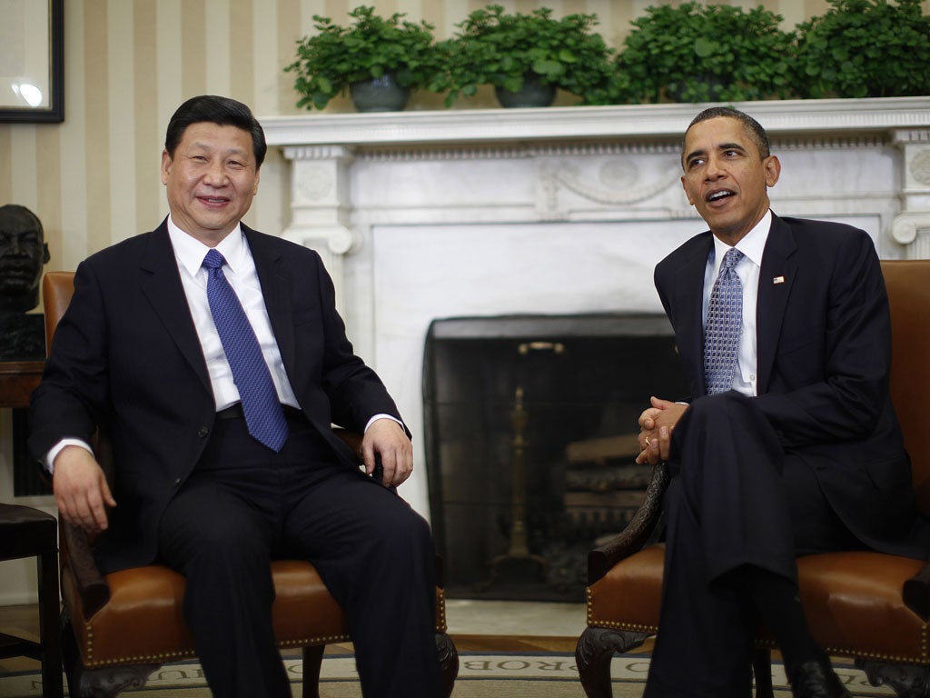 Barack Obama meets with China's Vice President Xi Jinping in the Oval Office
