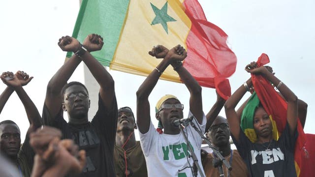Fadel Barro, a Y’En a Marre activist, addresses a rally in Dakar